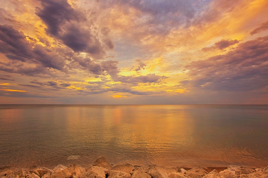 Evening Sky Above Still Lake Water