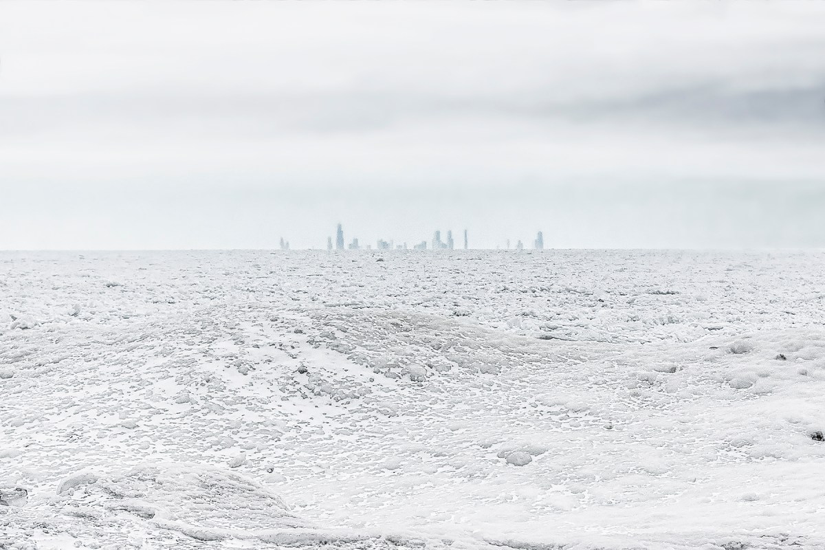 Chicago Skyline Beyond Frozen Lake Michigan